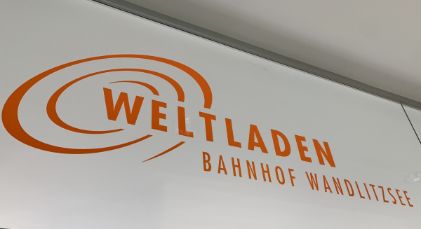 Weltladen Schild